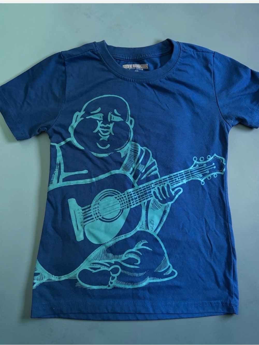 True Religion Blue Tee with Aqua Guitar Buddha Graphic